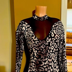 Almost new body suit. Size Large. Worn once.